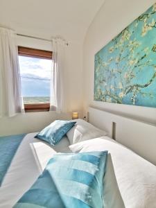 Postel nebo postele na pokoji v ubytování Apartment Marina