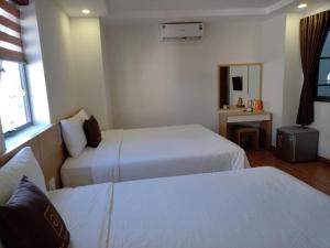 Кровать или кровати в номере Galaxy Hotel