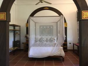 A bed or beds in a room at Phong Nha Farmstay 