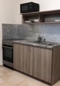 Kuchyň nebo kuchyňský kout v ubytování Hotel CK Park