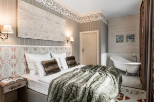 เตียงในห้องที่ Aries Hotel & SPA Wisła