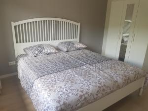 Postel nebo postele na pokoji v ubytování Dolce Vita Gerolstein -Dani