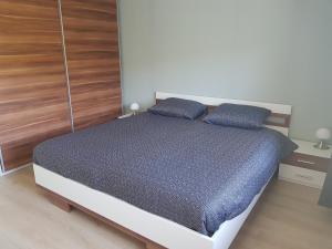 Postel nebo postele na pokoji v ubytování Dolce Vita Gerolstein -Dani