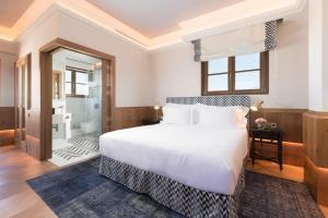 Posteľ alebo postele v izbe v ubytovaní Palacio Solecio, a Small Luxury Hotel of the World