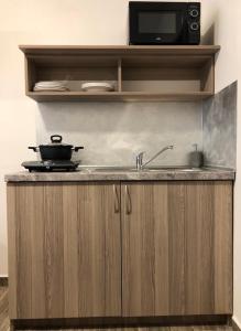 Kuchyň nebo kuchyňský kout v ubytování Hotel CK Park
