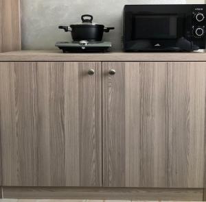 Kuchyň nebo kuchyňský kout v ubytování Hotel CK Park