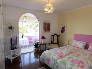 Ένα ή περισσότερα κρεβάτια σε δωμάτιο στο Villa Erika Madeira +57 φωτογραφίες