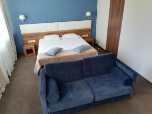 
Кровать или кровати в номере Гостиница Маяк
