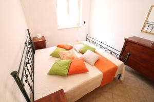 En eller flere senge i et værelse på Casa Vacanze Martina a Otranto