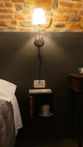 Postel nebo postele na pokoji v ubytování LO studiO B&B
