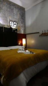 Postel nebo postele na pokoji v ubytování LO studiO B&B