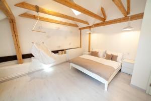 Rúm í herbergi á Apartmány Dačický 2