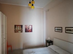 Tempat tidur dalam kamar di Central Apartment - Residenza Battistessa