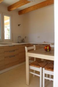 A kitchen or kitchenette at Trullo Le Macchie