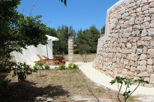 A garden outside Trullo Le Macchie
