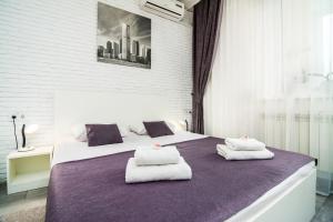 Krevet ili kreveti u jedinici u okviru objekta SkyHome Mini-hotel