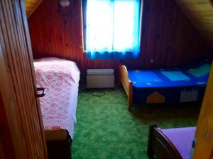 Fotografie z fotogalerie ubytování Gowidlino - Domek Letniskowy nad Jeziorem v destinaci Gowidlino + 2 fotografie
