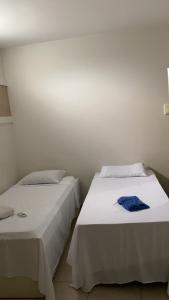 Uma cama ou camas num quarto em Hostel Zampollo