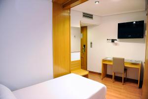 TV a/nebo společenská místnost v ubytování Hotel El Churra