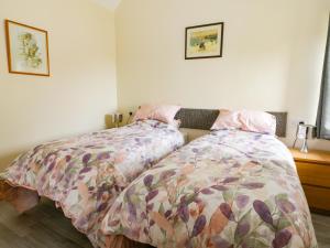 מיטה או מיטות בחדר ב-Meadow View