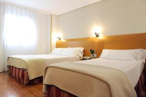 Postel nebo postele na pokoji v ubytování Hotel El Churra + 37 fotografií