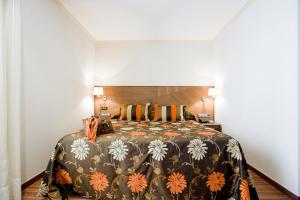 Postel nebo postele na pokoji v ubytování Hotel El Churra