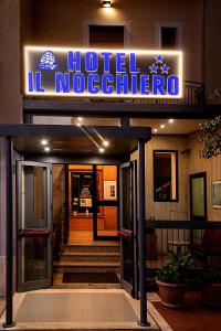 a hotel lobby with a sign that reads hotel no detector at Il Nocchiero City Hotel in Soverato Marina