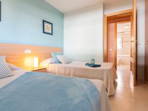 Posteľ alebo postele v izbe v ubytovaní Holiday Home Lorena by Interhome