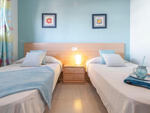 Posteľ alebo postele v izbe v ubytovaní Holiday Home Lorena by Interhome