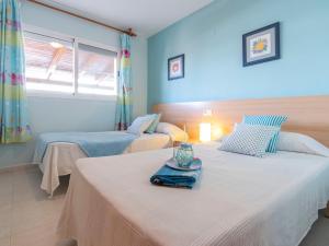 Posteľ alebo postele v izbe v ubytovaní Holiday Home Lorena by Interhome