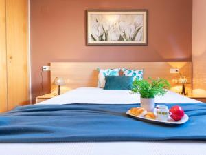 Posteľ alebo postele v izbe v ubytovaní Holiday Home Lorena by Interhome