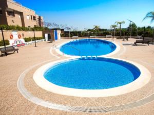 The swimming pool at or close to Apartment Jardin by Interhome