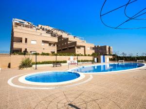 The swimming pool at or close to Apartment Jardin by Interhome