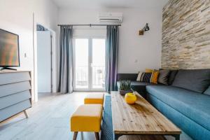Posezení v ubytování AD32 Apartamento Luminoso a los pies del Puente de Triana