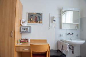 Baðherbergi á Garni Moderno