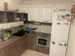 Una cocina o kitchenette en Guest House Dacha