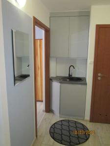 Kuchyň nebo kuchyňský kout v ubytování Apartament nad jeziorem Białym + 8 fotografií