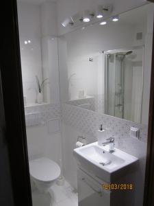Koupelna v ubytování Apartament nad jeziorem Białym