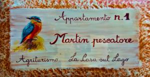 Posta FibrenoにあるLa Casa Sul Lagoの名刺の鳥絵