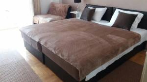 Postel nebo postele na pokoji v ubytování Liberta Apartment