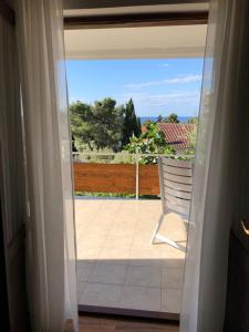 Ein Balkon oder eine Terrasse in der Unterkunft DD apartmani