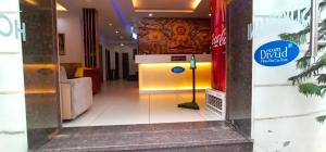 a lobby of a church with a sign on the wall at DIVUD ECOM HOTEL- 30 Meters From Golden Temple in Amritsar