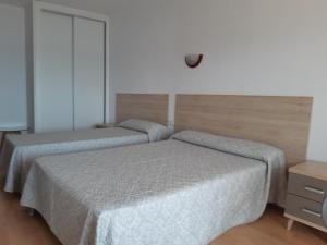 Postel nebo postele na pokoji v ubytování Hotel Condestable