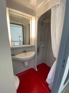 Koupelna v ubytování Boutique Hotel Lumaa Marinero