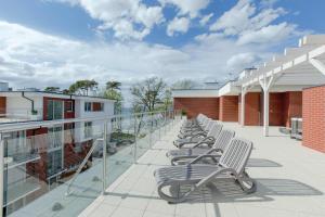 Balkón alebo terasa v ubytovaní Resort Apartamenty Klifowa Rewal 32