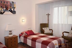 Apartamento en el centro de Alicante tesisinde bir odada yatak veya yataklar