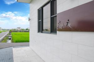 En balkong eller terrasse på 渡小夜電梯民宿 Yilannight B&B
