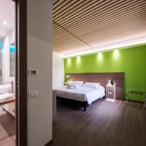 Voodi või voodid majutusasutuse Hotel Marelet toas