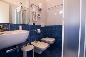 Koupelna v ubytování Hotel Caraibi