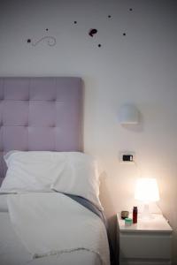 Postel nebo postele na pokoji v ubytování Hotel Caraibi